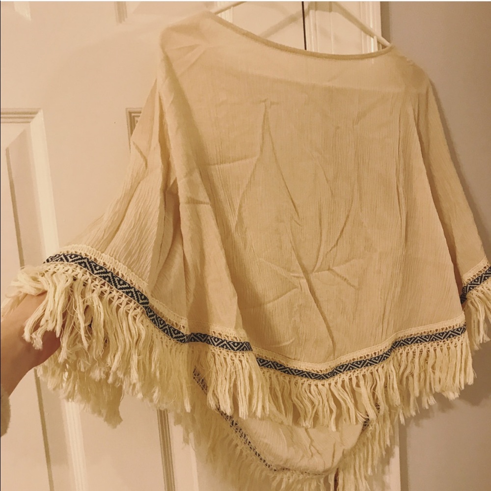 Poncho-style top w/ open back & fringe